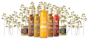Farrington Oils Mellow Yellow rapeseed oil products with rapeseed plants backdrop