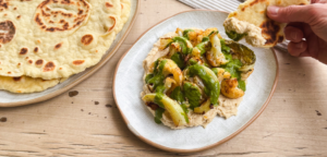 Baharat roasted cauliflower with a butterbean hummus and coriander dressing