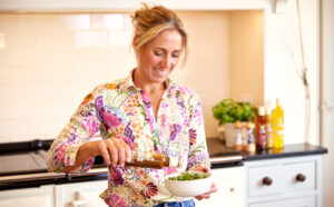 Eli Farrington cooking in the Mellow yellow kitchen